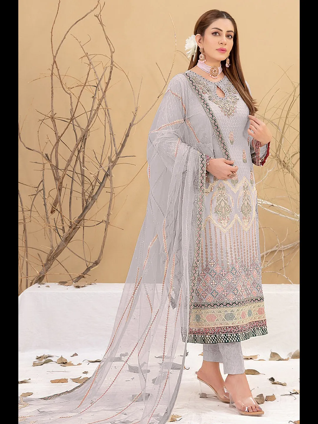 Beige Georgette Pant Suit With Prettified Embroidery Work