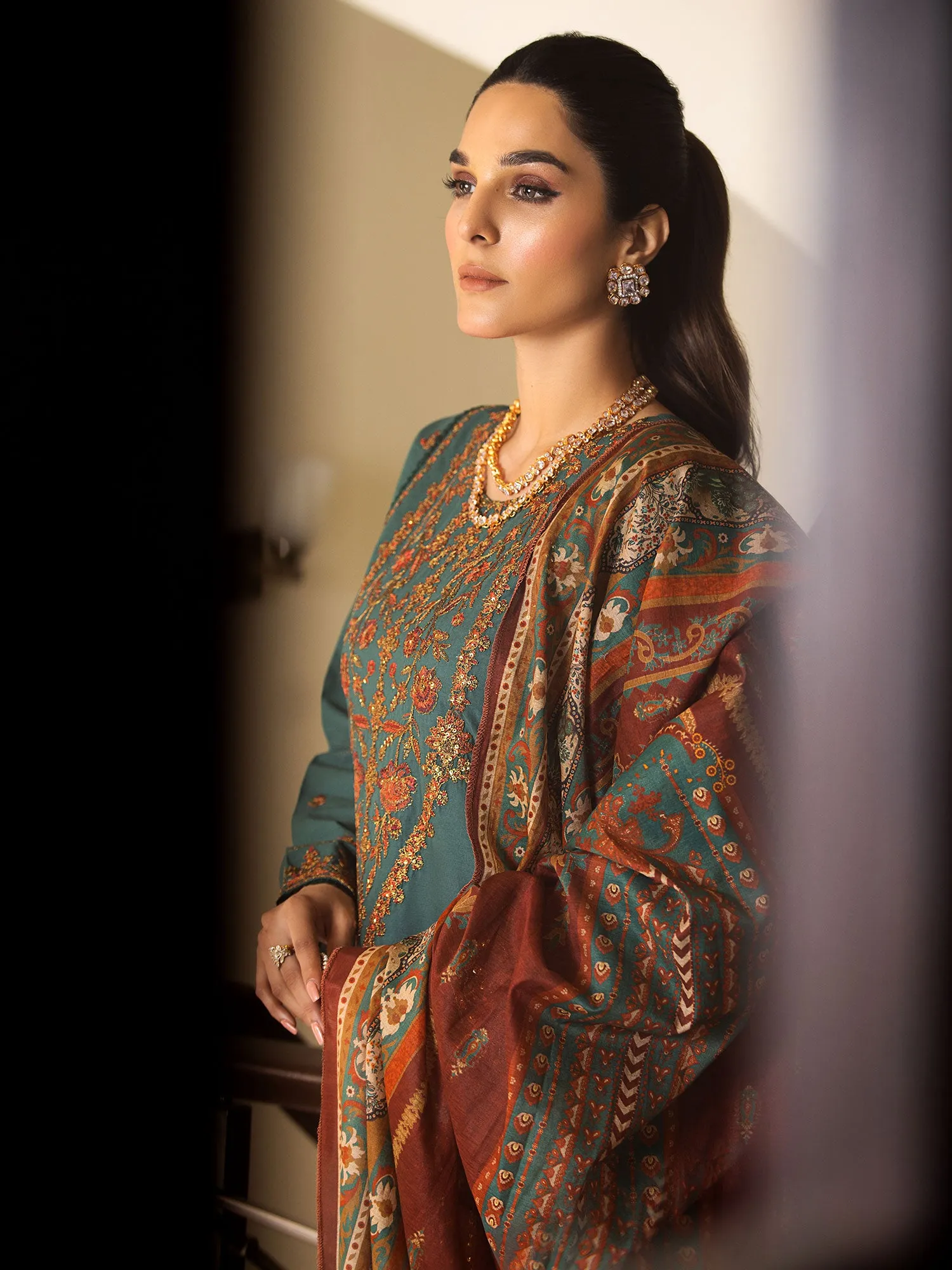 Heera's Green Embroidered Cambric Cotton Suit